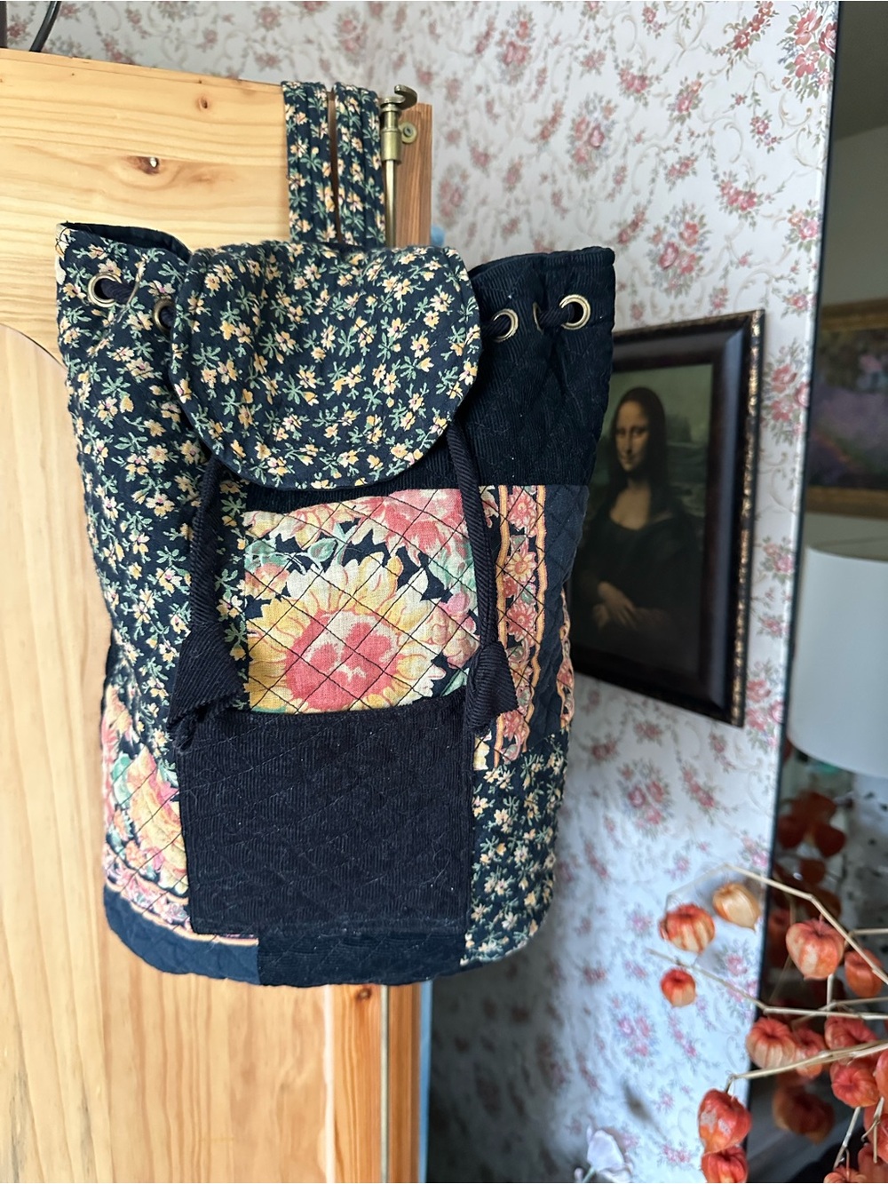 April Cornell/La Cache Boho Black Floral Patchwork Quilted Backpack, $35